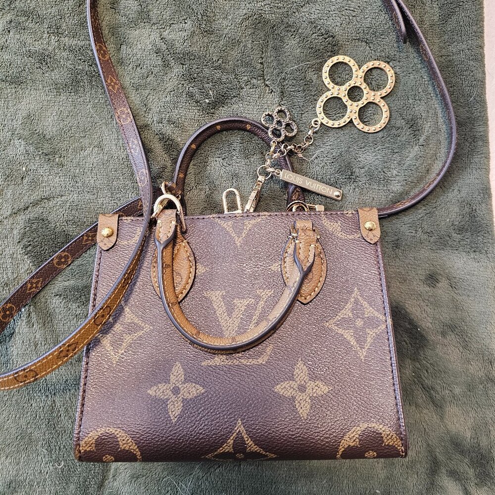 Louis vuitton red interior petite bag